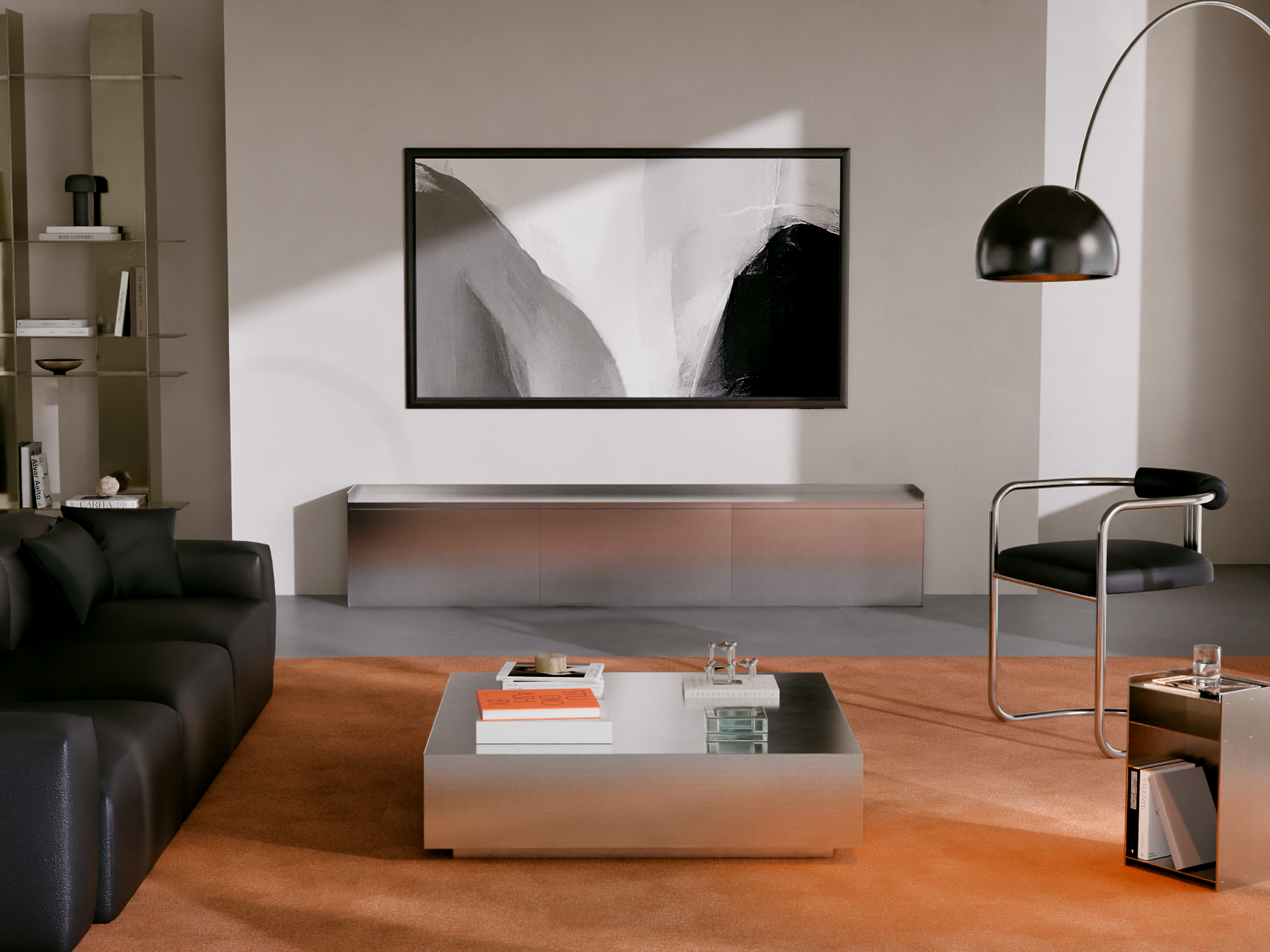 S95H Silver interior featuring sleek silver media console, black sofa, and warm orange carpet for a contemporary and sophisticated living room.