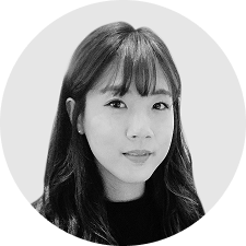 A woman with long hair and bangs.