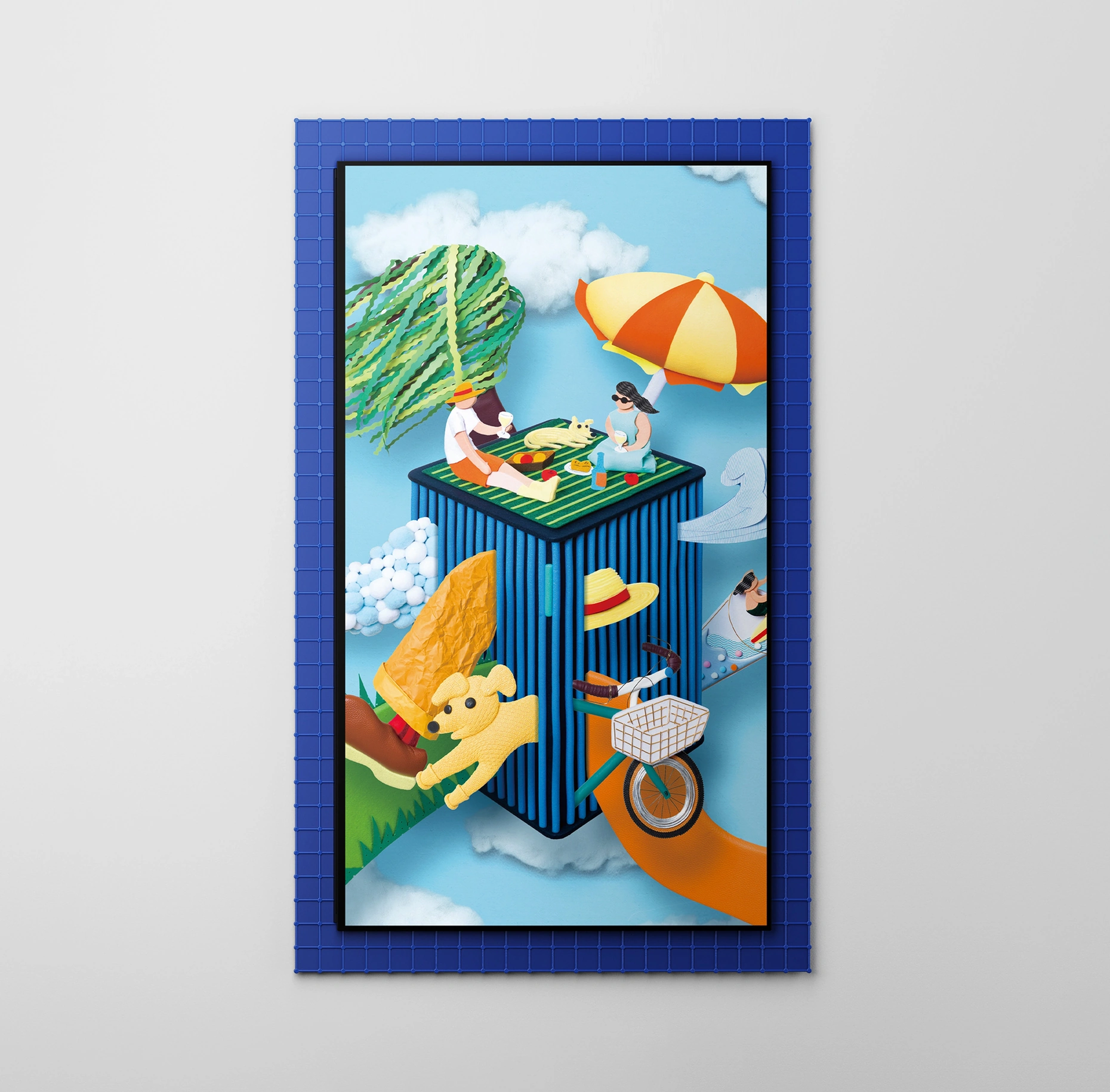 Inside a dark blue frame with repeating small square grids is the Infinite AI Air Purifier, a large blue air purifier with vertical slats across its front. Two people and a dog rest on a mat above it, while a willow tree, parasol, and bicycle create a peaceful early-summer scene.