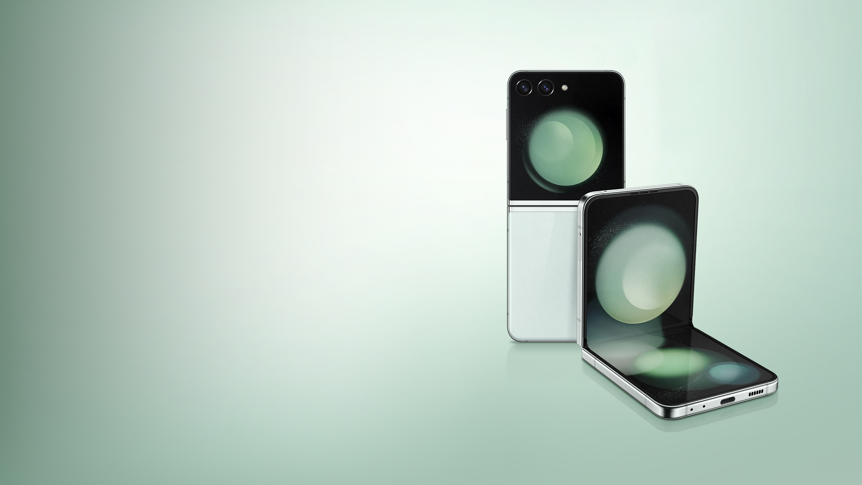 An image of a Galaxy Z Flip5 Mint color product and a wallpaper of the Galaxy Z Flip5 in the product’s Flex Window.