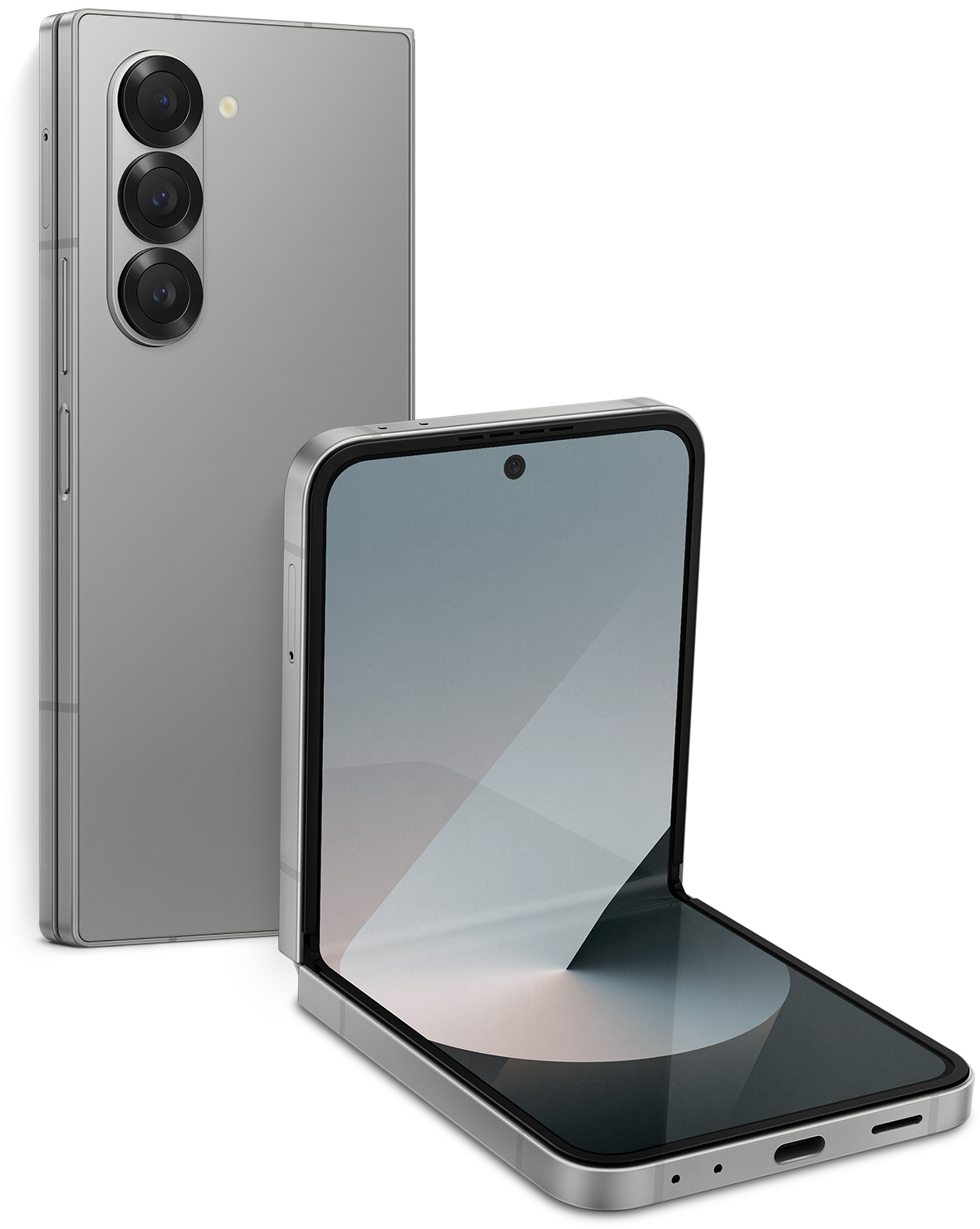 The Galaxy Z Fold 6 Silver Shadow standing facing the camera, with the Z Flip 6 Z Silver Shadow in front of it, opened at ninety degrees. The product background is a monotone, grayish image with sculptural details.
