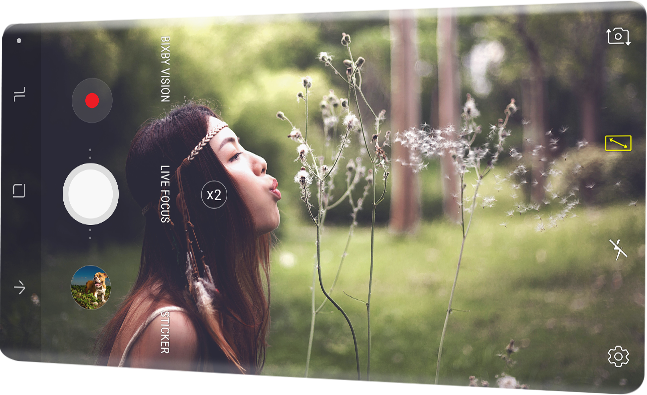 An image shows two Samsung Galaxy Note 8 overlapping, the device in front showing the camera screen on its display. 