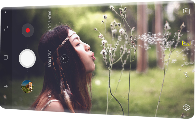 An image shows two Samsung Galaxy Note 8 overlapping, the device in front showing the camera screen on its display. 