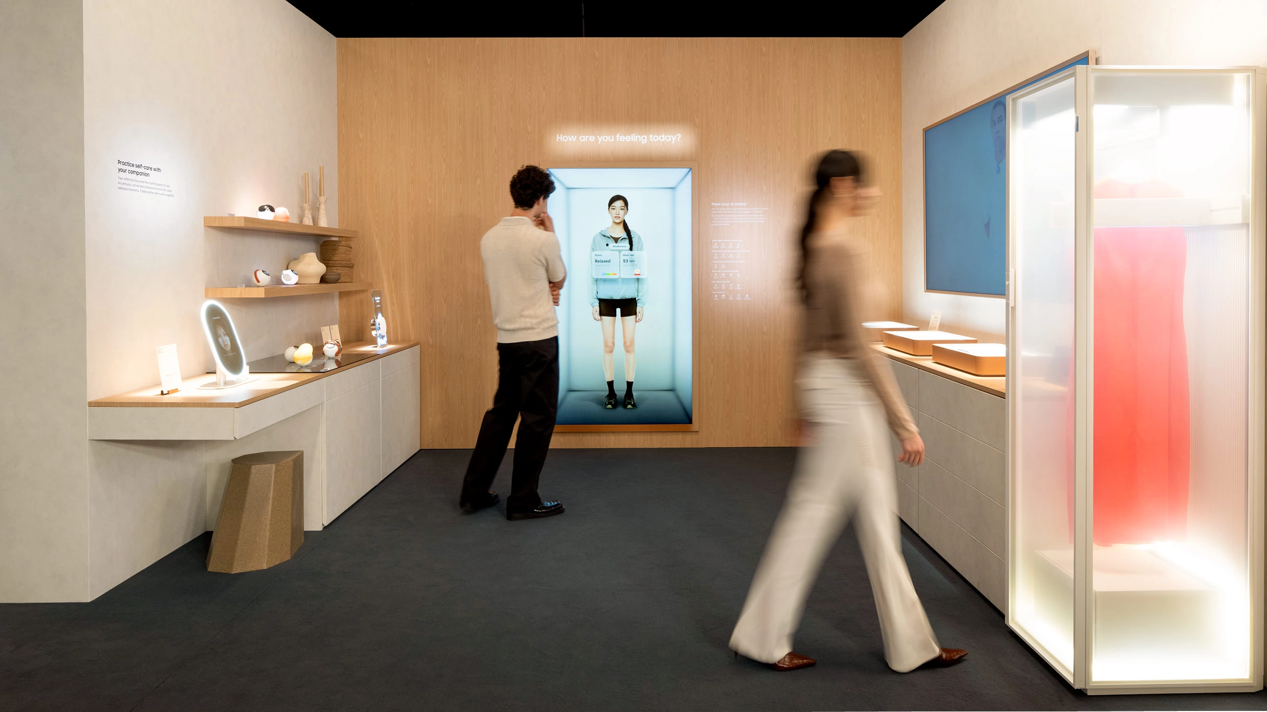 Visitors viewing an AI avatar in the Humanity in Every Life section.