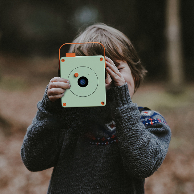 A child using a camera made with Robin.