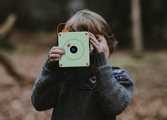 A child using a camera made with Robin.