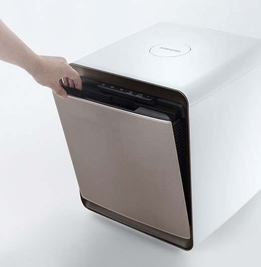 This is an image of a hand opening the front cover of the Samsung Cube.