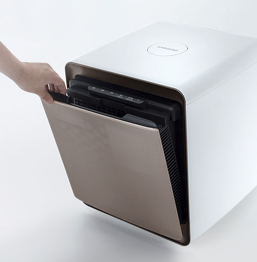 This is an image of a hand opening the front cover of the Samsung Cube.